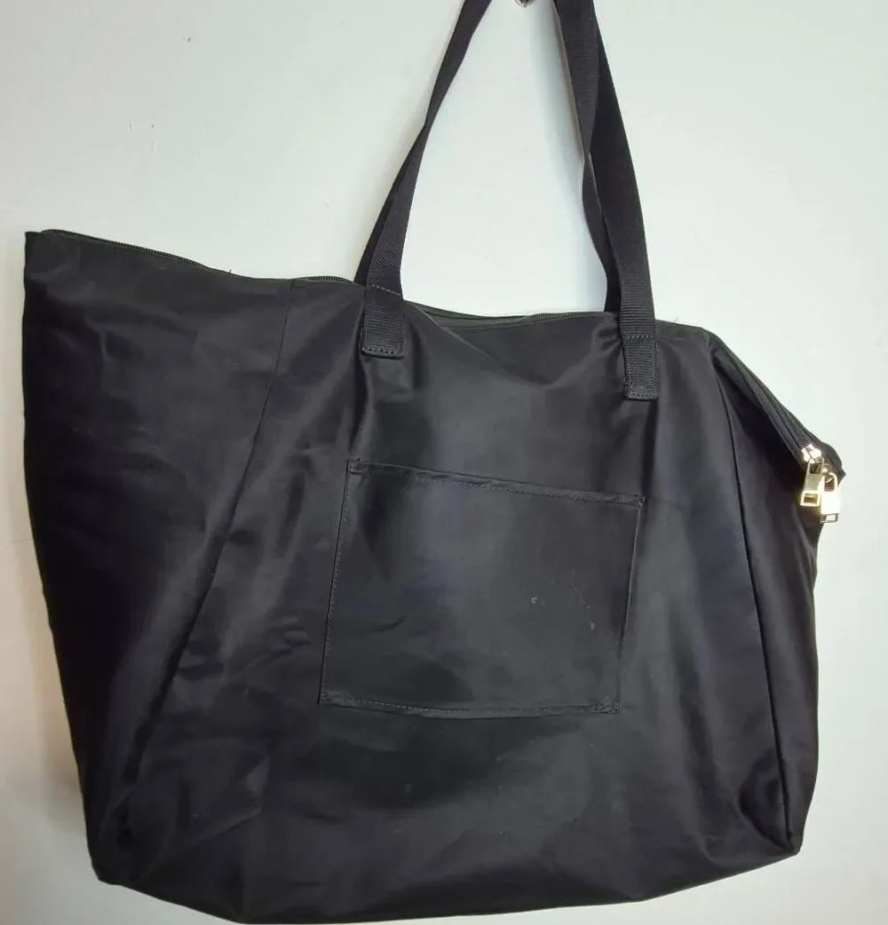 Tumi Voyager tote